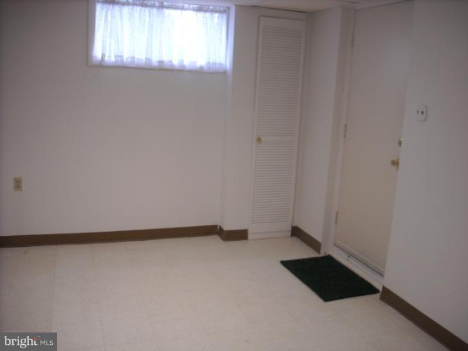 1215 Roxboro Road Rosedale, MD 21237 - Photo 2 of 29 a view of an empty room and window