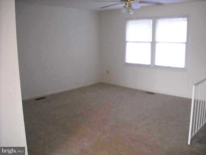1215 Roxboro Road Rosedale, MD 21237 - Photo 4 of 29 an empty room with a window