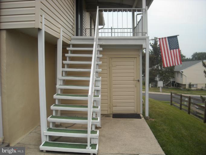 1215 Roxboro Road Rosedale, MD 21237 - Photo 5 of 29 a view of a house with a door and a yard