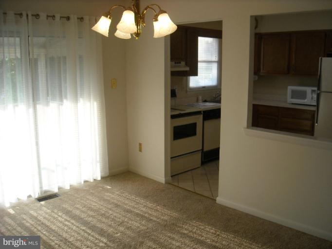 1215 Roxboro Road Rosedale, MD 21237 - Photo 10 of 29 a view of kitchen and front door