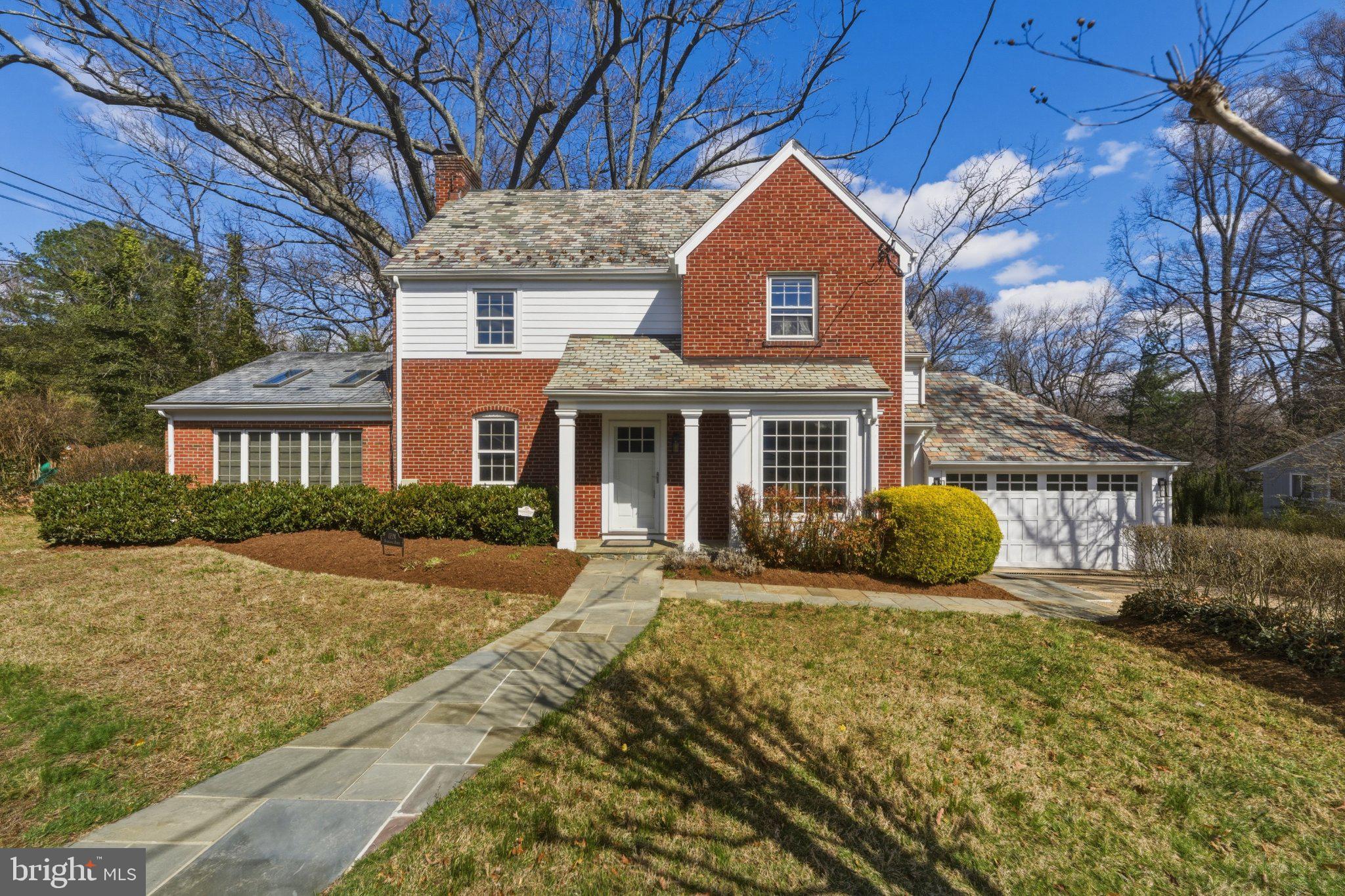 1724 Overlook Drive Silver Spring, MD 20903 - Photo 1 of 57 Charming brick home with lush greenery.