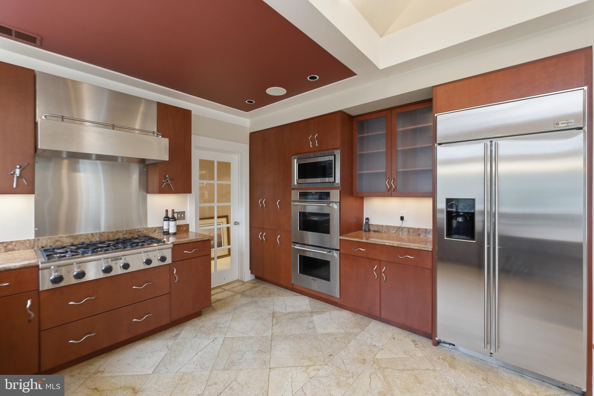 1724 Overlook Drive Silver Spring, MD 20903 - Photo 23 of 57 Sleek modern kitchen with elegant finishes.