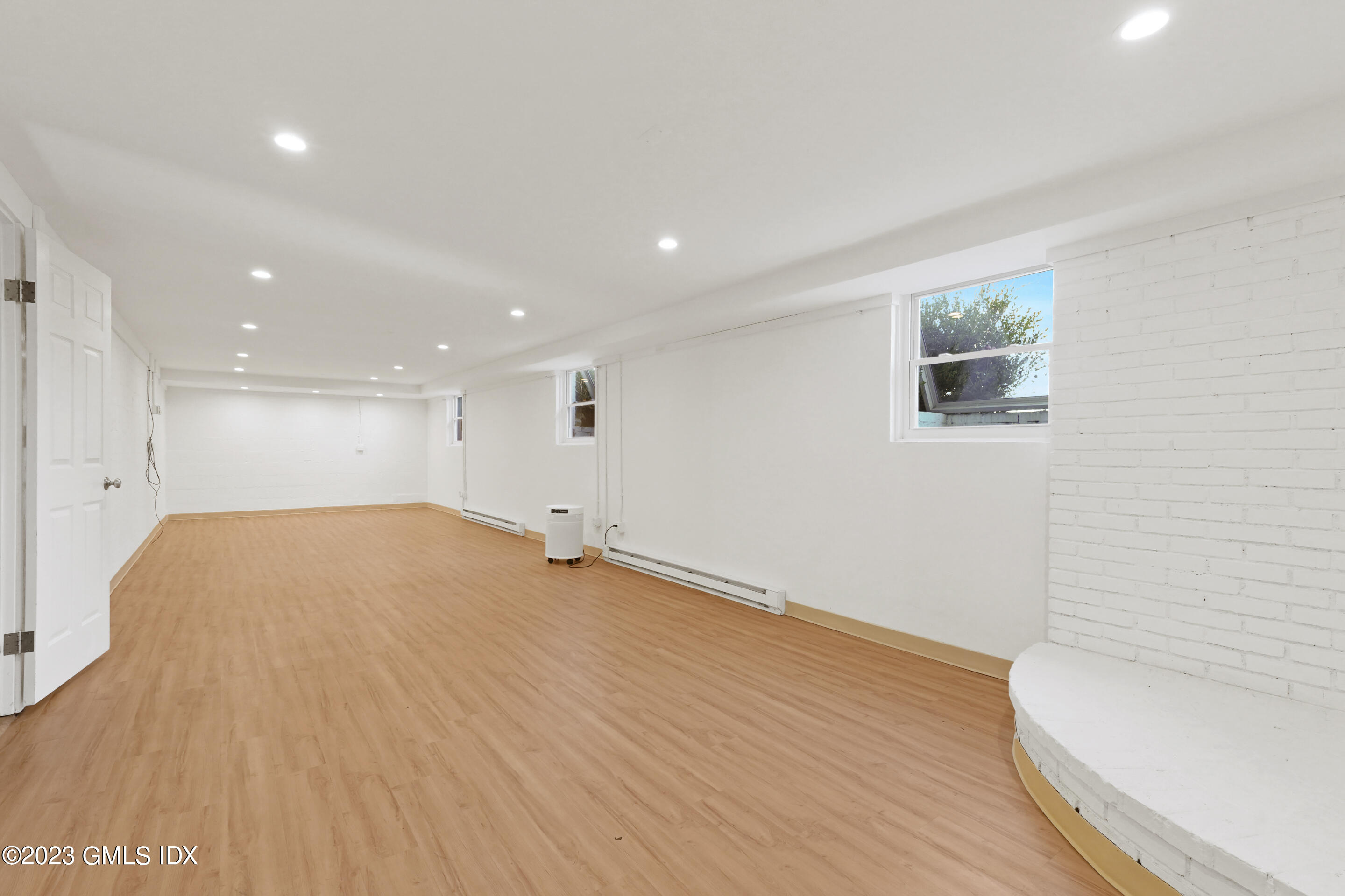 2279 High Ridge Road Stamford, CT 06903 - Photo 16 of 22 a view of empty room with wooden floor