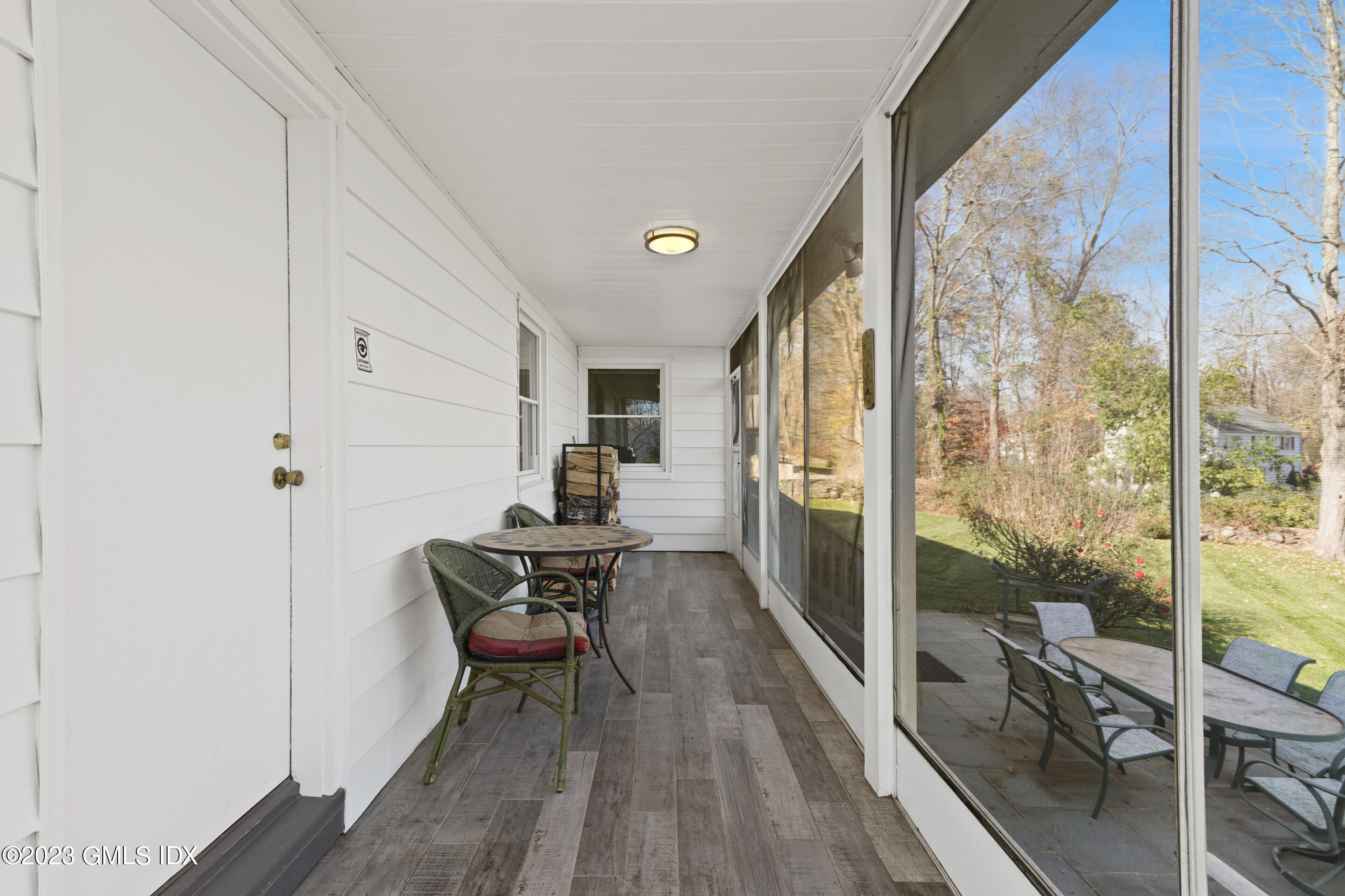 2279 High Ridge Road Stamford, CT 06903 - Photo 18 of 22 a living room with furniture and a wooden floor