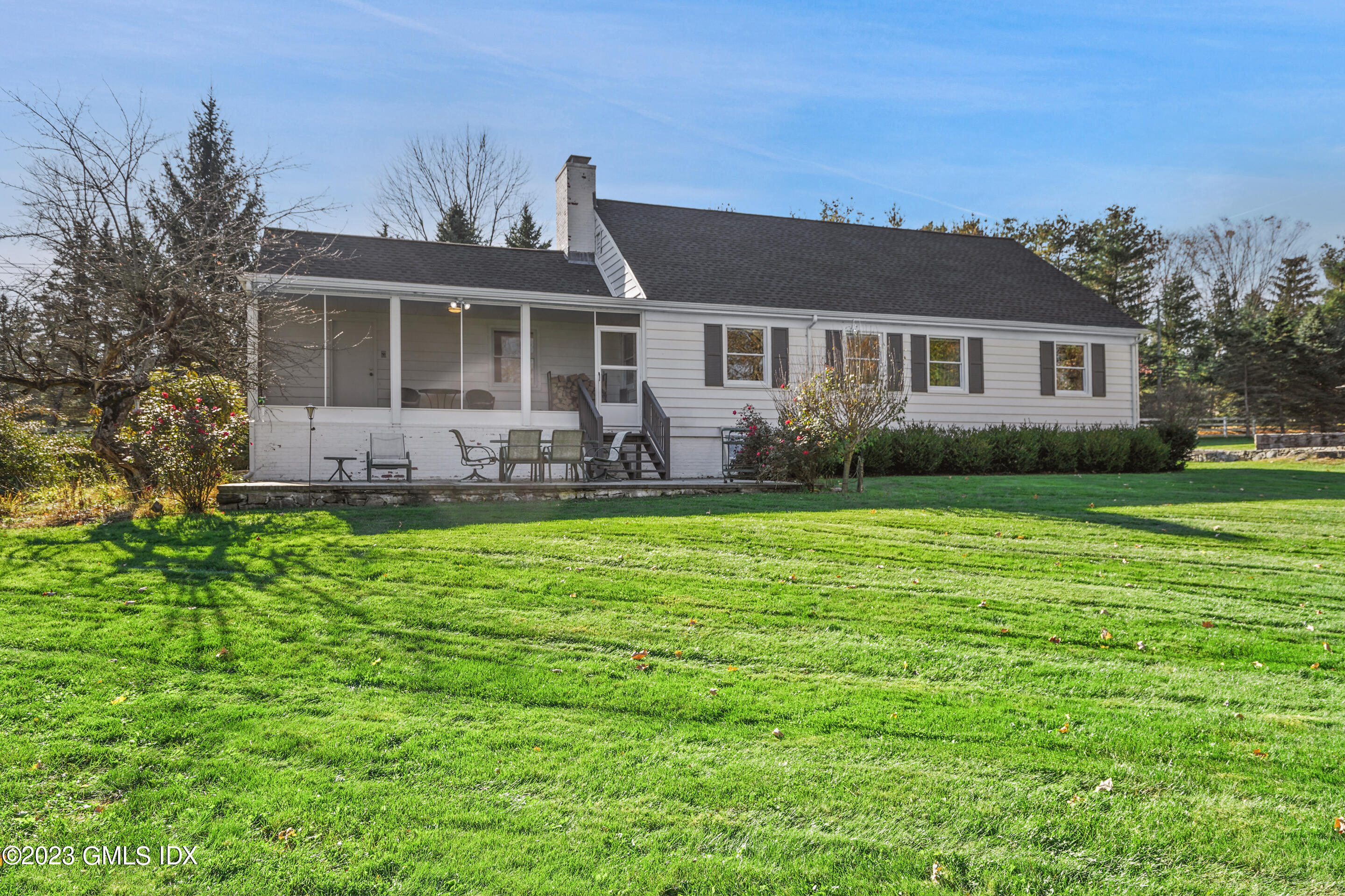 2279 High Ridge Road Stamford, CT 06903 - Photo 19 of 22 a front view of house with yard and green space
