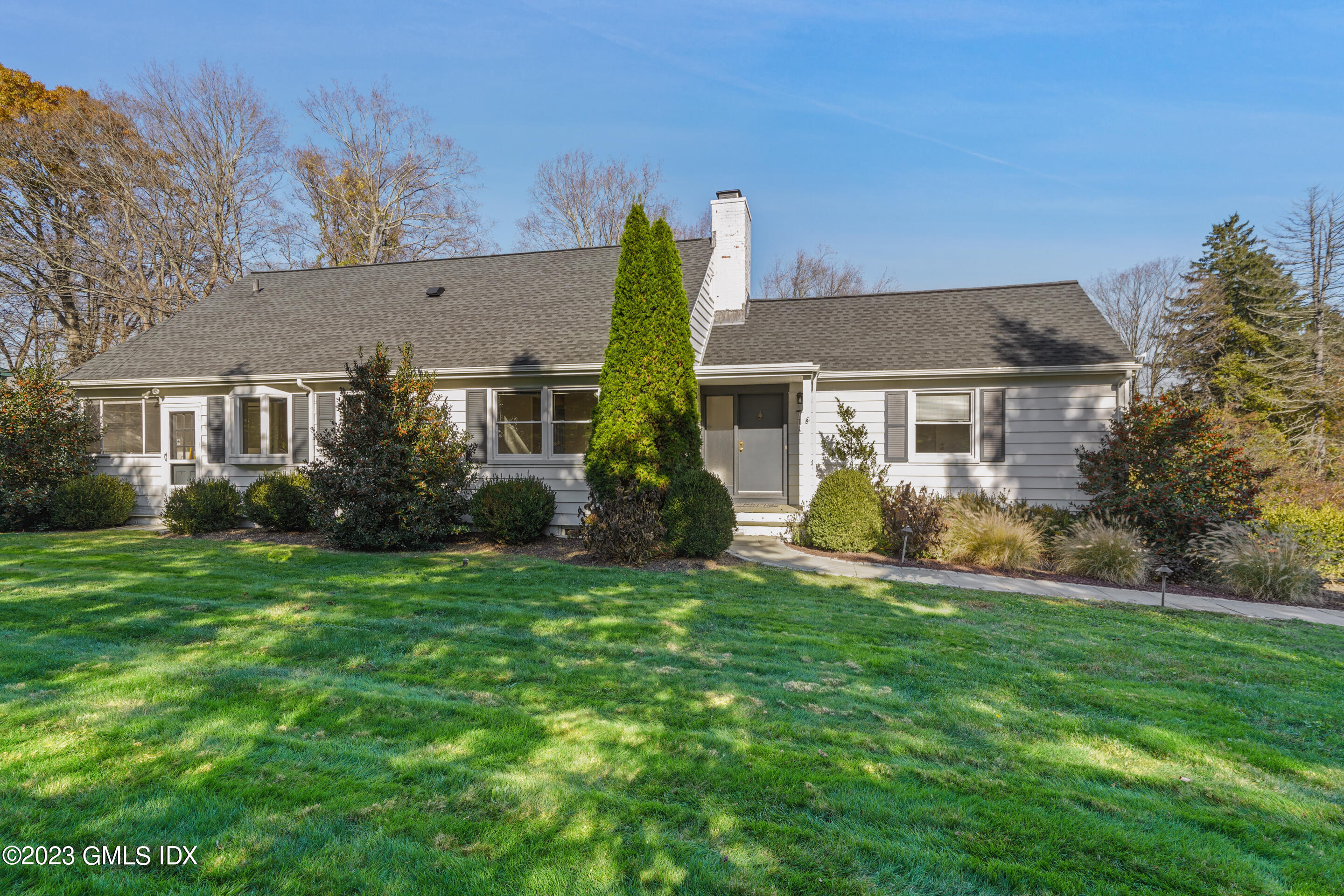 2279 High Ridge Road Stamford, CT 06903 - Photo 2 of 22 front view of a house with a yard