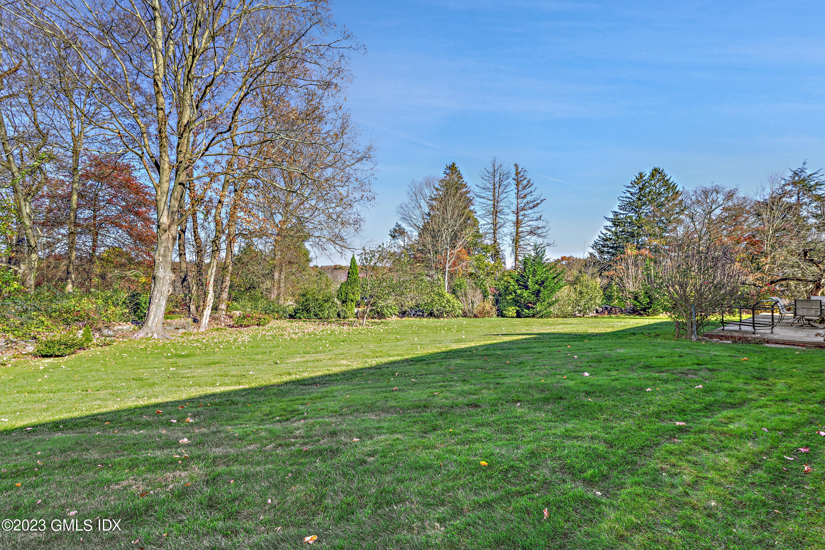2279 High Ridge Road Stamford, CT 06903 - Photo 22 of 22 a big yard with lots of green space and palm trees
