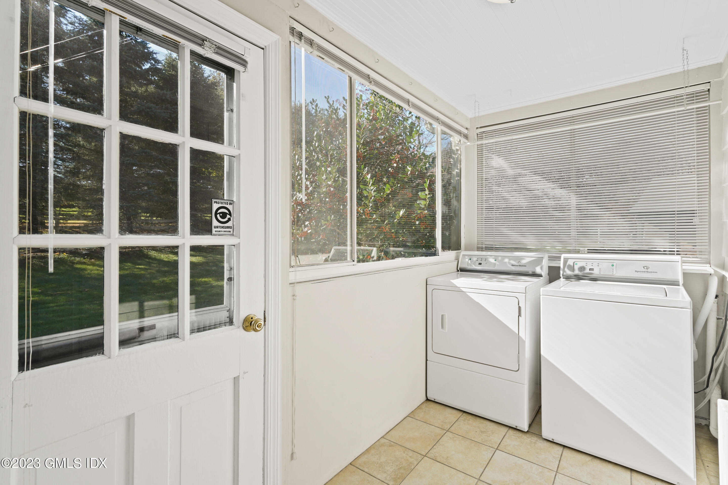 2279 High Ridge Road Stamford, CT 06903 - Photo 8 of 22 a view of a white house with a large window