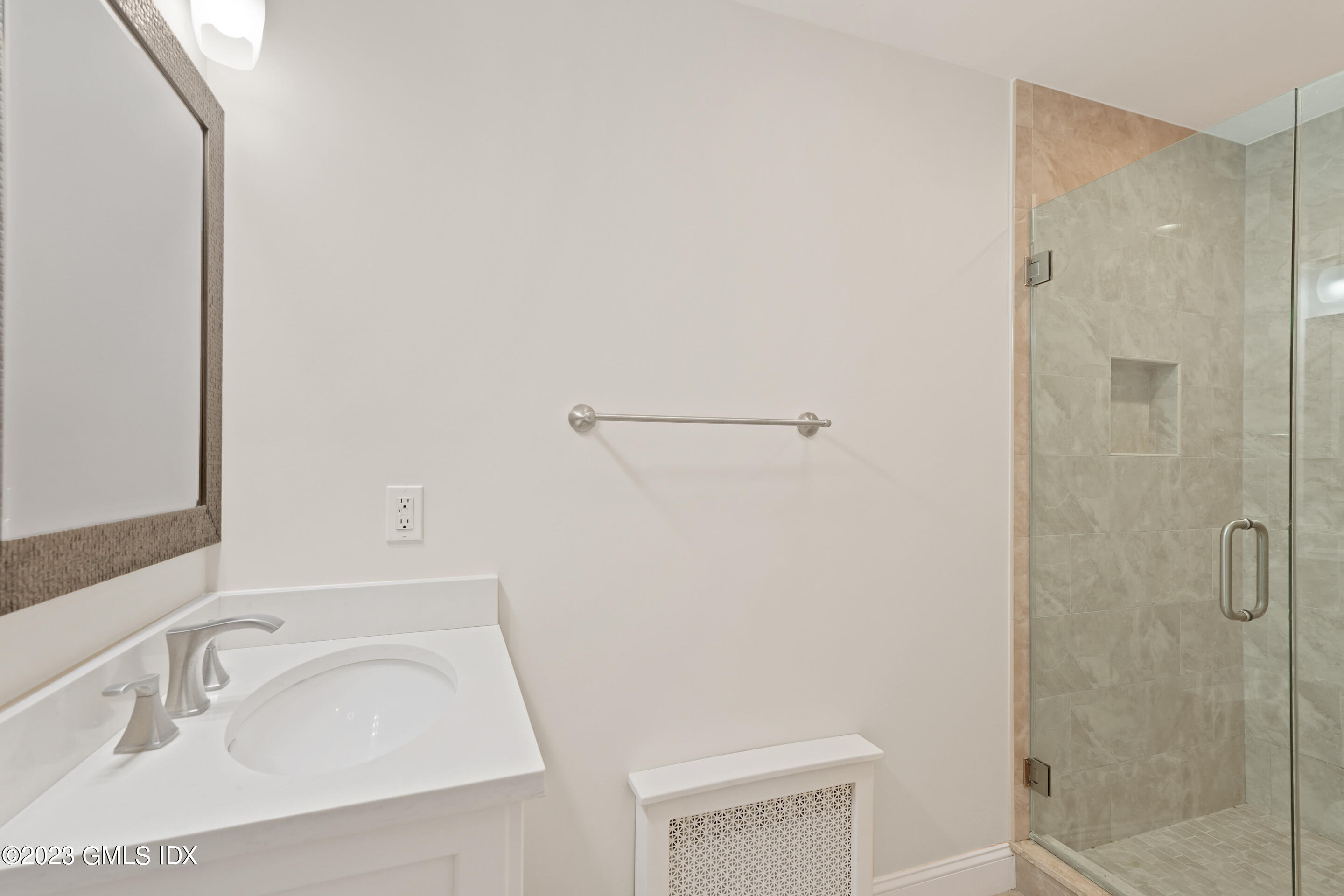 2279 High Ridge Road Stamford, CT 06903 - Photo 10 of 22 a bathroom with a sink and shower