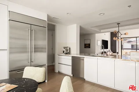 a room with a bed and a mirror