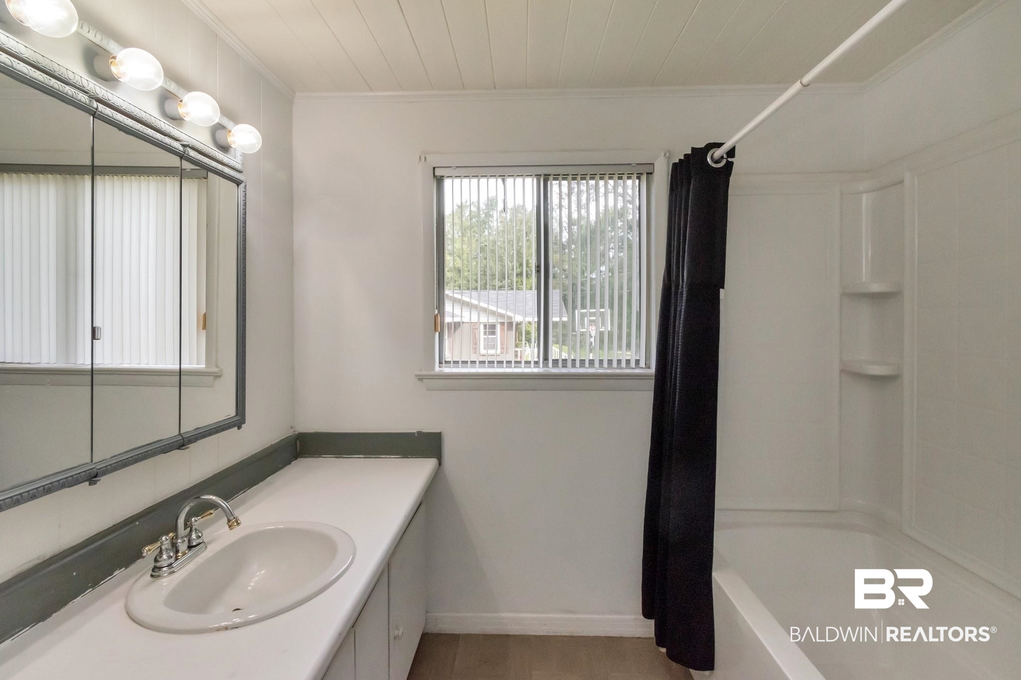 209 Bemis Street Saraland, AL 36571 - Photo 11 of 16 upstairs bathroom