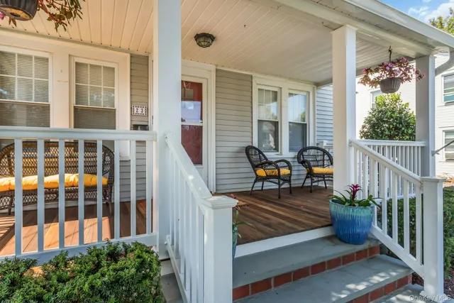 a balcony view with a garden space