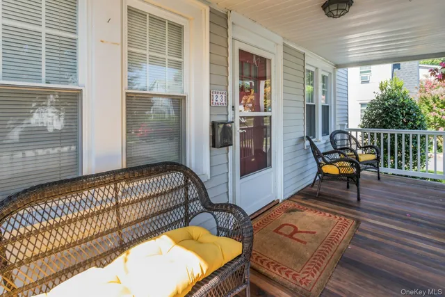 a swimming pool with outdoor seating