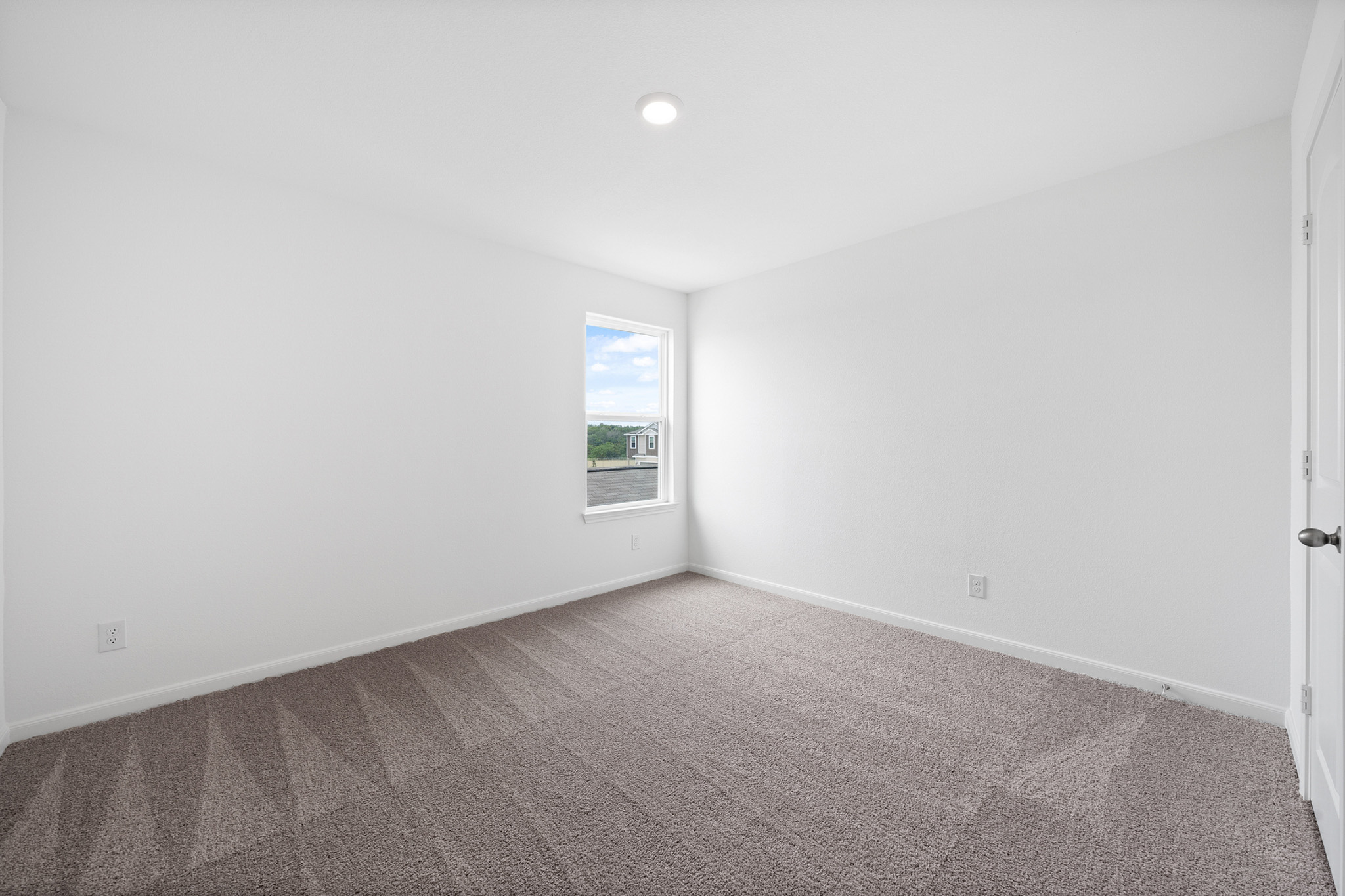 197 Fairlawn Way Maxwell, TX 78656 - Photo 10 of 14 Unfurnished room featuring baseboards and carpet flooring