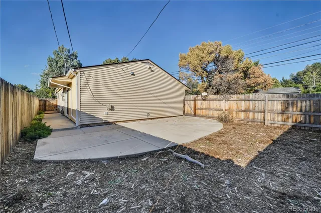 a view of a pathway of a wooden building