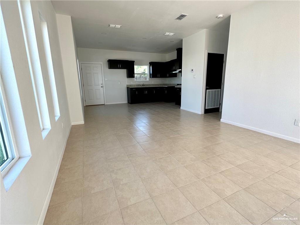 209 Rafael Drive, Unit 2 San Juan, TX 78589 - Photo 5 of 13 a view of a kitchen with a sink