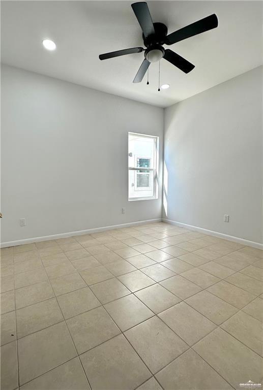 209 Rafael Drive, Unit 2 San Juan, TX 78589 - Photo 10 of 13 an empty room with windows and fan