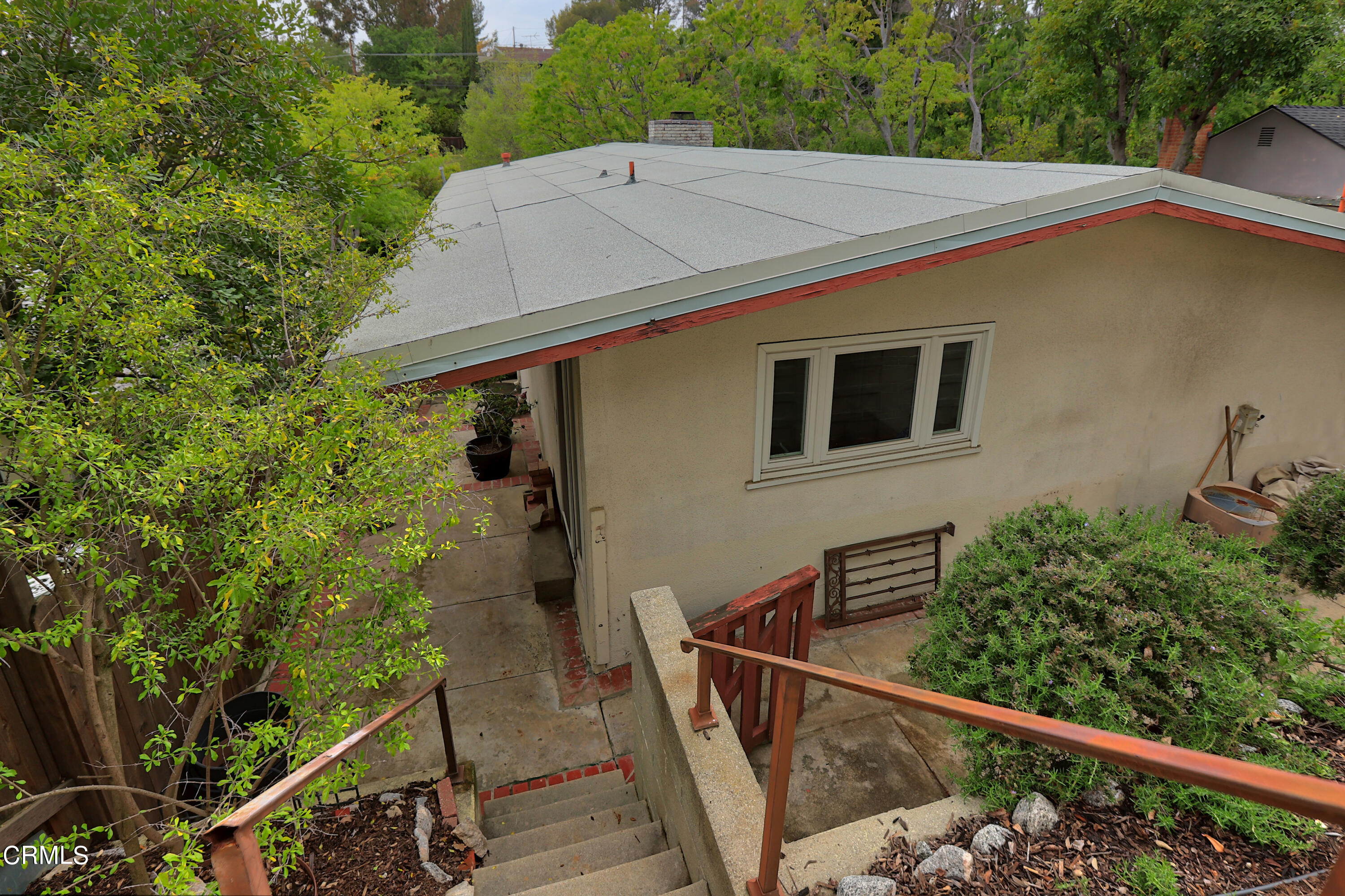 400 Glenullen Drive Pasadena, CA 91105 - Photo 17 of 19 a aerial view of a house with large trees