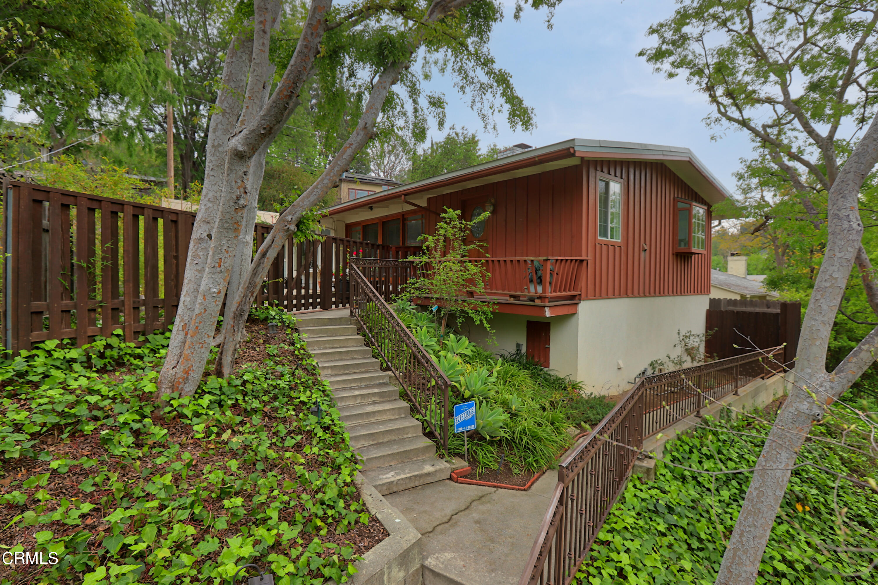 400 Glenullen Drive Pasadena, CA 91105 - Photo 2 of 19 a front view of a house with garden