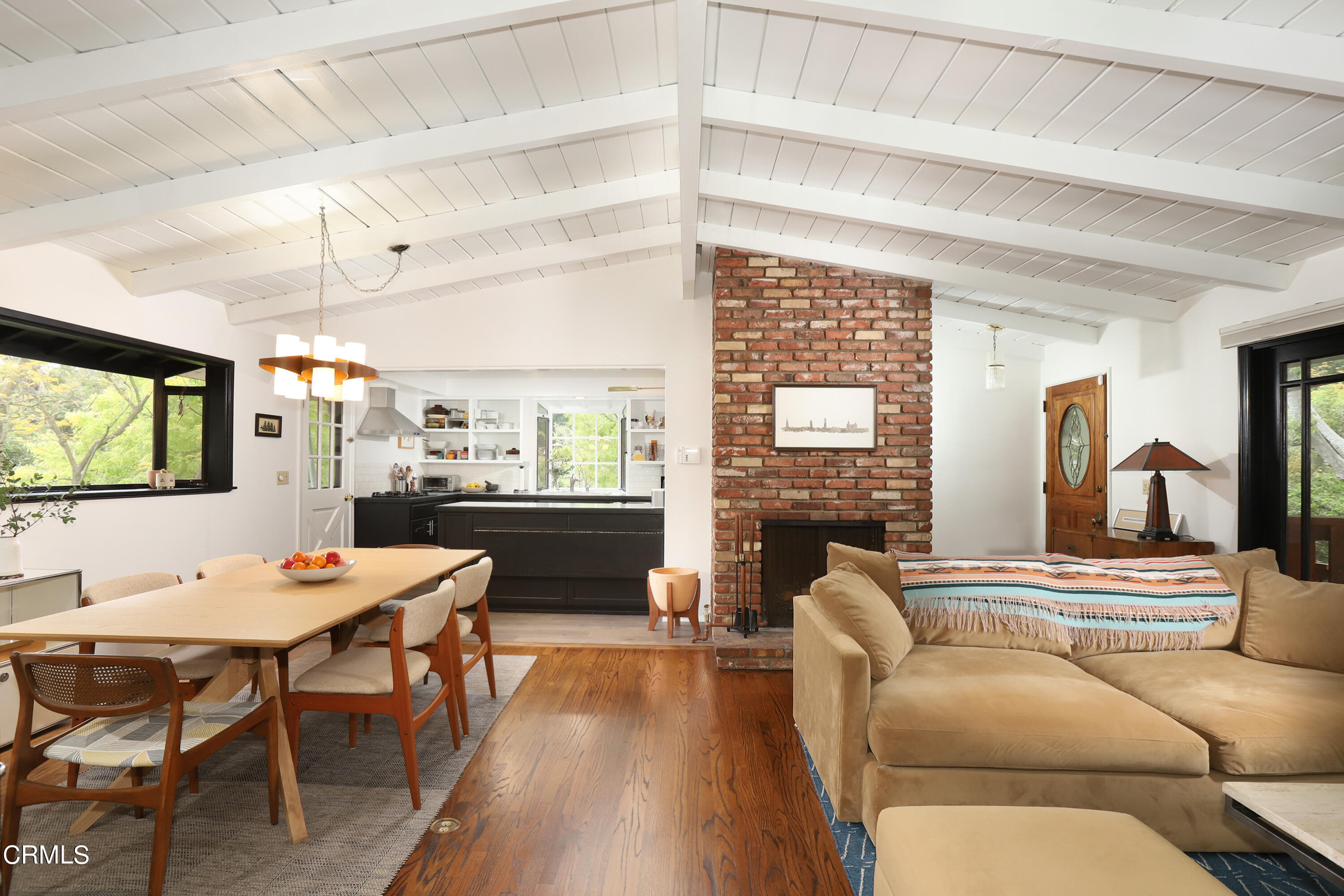 400 Glenullen Drive Pasadena, CA 91105 - Photo 4 of 19 a living room with fireplace furniture and a large window