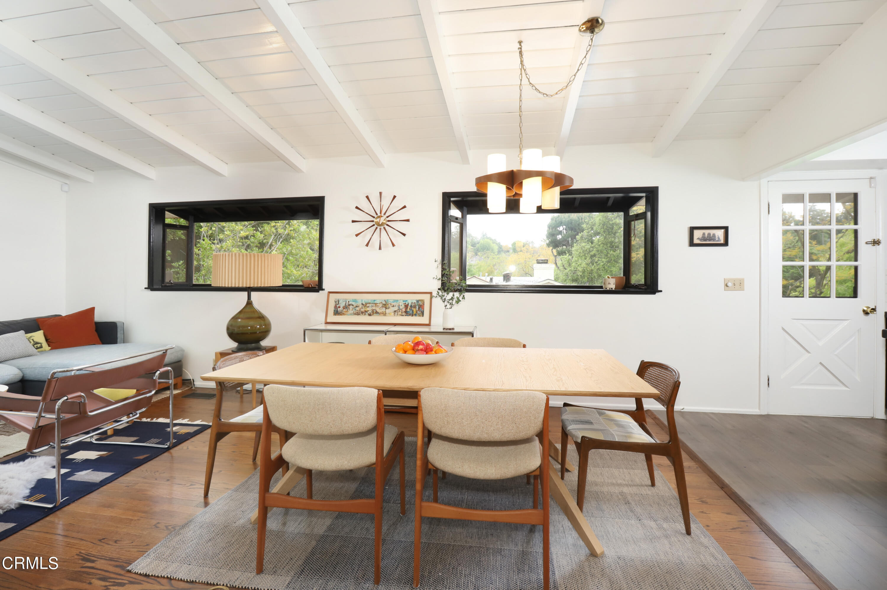 400 Glenullen Drive Pasadena, CA 91105 - Photo 7 of 19 a view of a dining room with furniture and chandelier