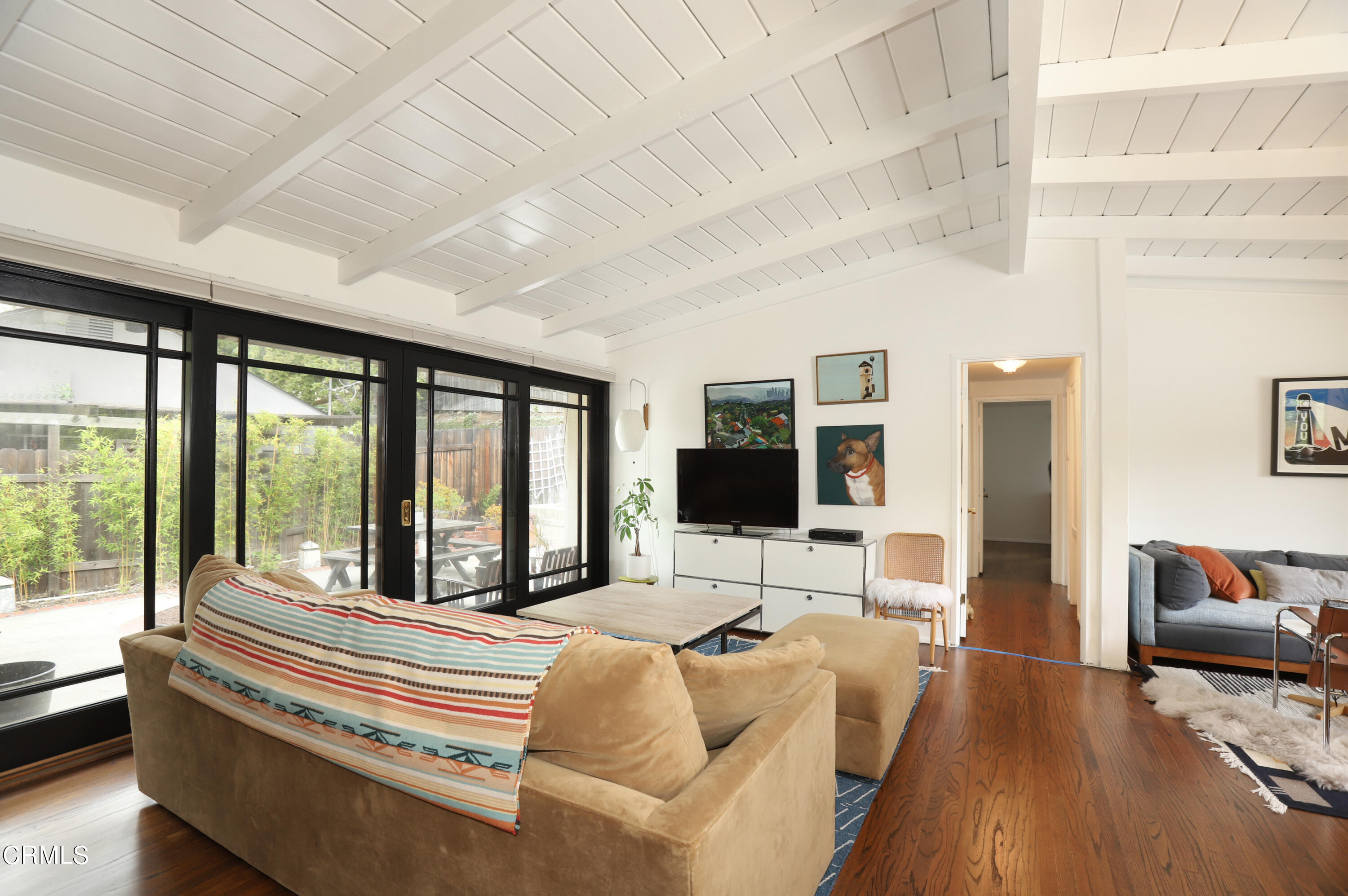 400 Glenullen Drive Pasadena, CA 91105 - Photo 8 of 19 a bedroom with furniture and a large window