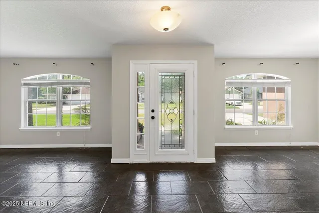 a view of an empty room with window