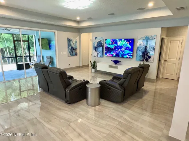 a bathroom with a shower and a sink