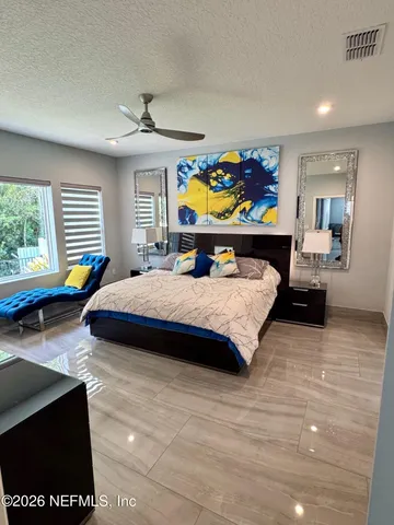 a view of a park with large trees