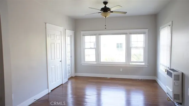 a kitchen with refrigerator and window