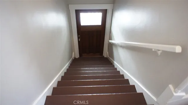 a view of outdoor space with deck and furniture