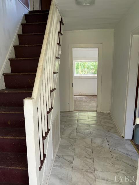 3770 Elon Road Monroe, VA 24574 - Photo 9 of 17 a view of entryway with stairs and wooden floor