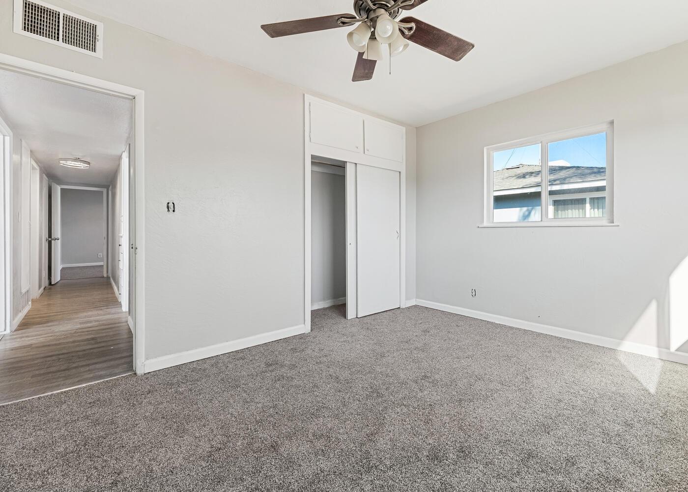 1265 South Klein Avenue Reedley, CA 93654 - Photo 20 of 31 a view of an empty room with a window