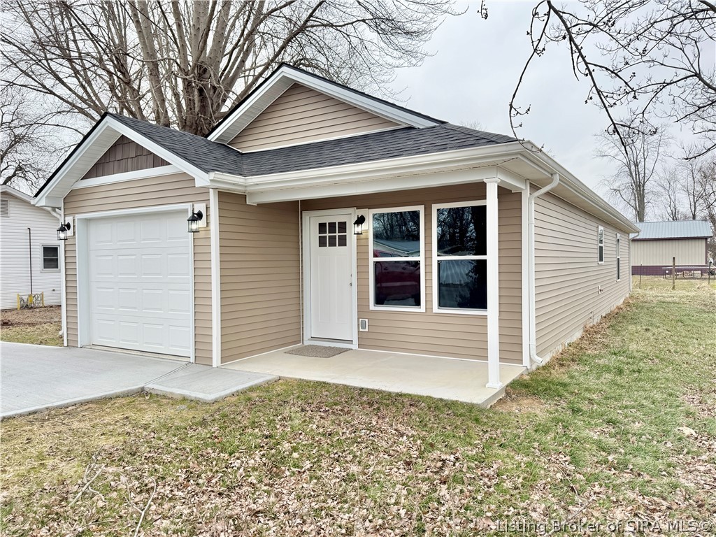 243 Oak Street Austin, IN 47102 - Photo 2 of 17 Front