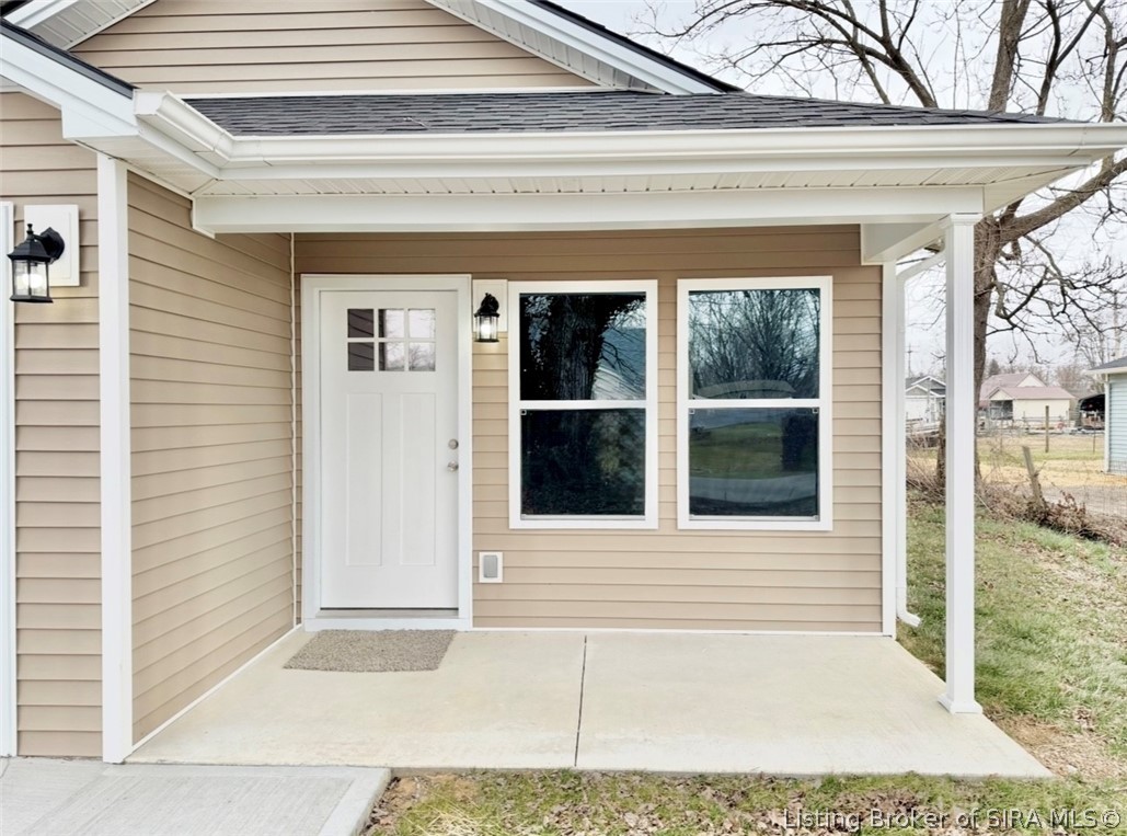 243 Oak Street Austin, IN 47102 - Photo 4 of 17 Covered Porch