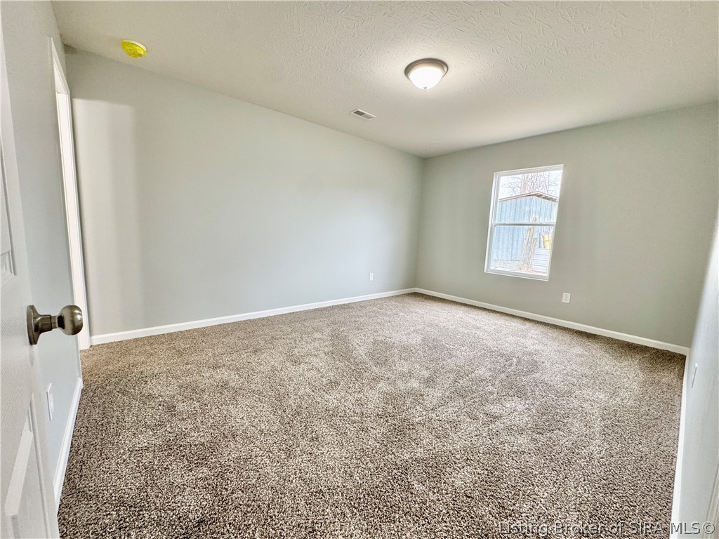 243 Oak Street Austin, IN 47102 - Photo 9 of 17 Main Bedroom