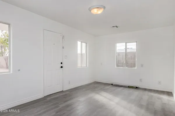 an empty room with windows