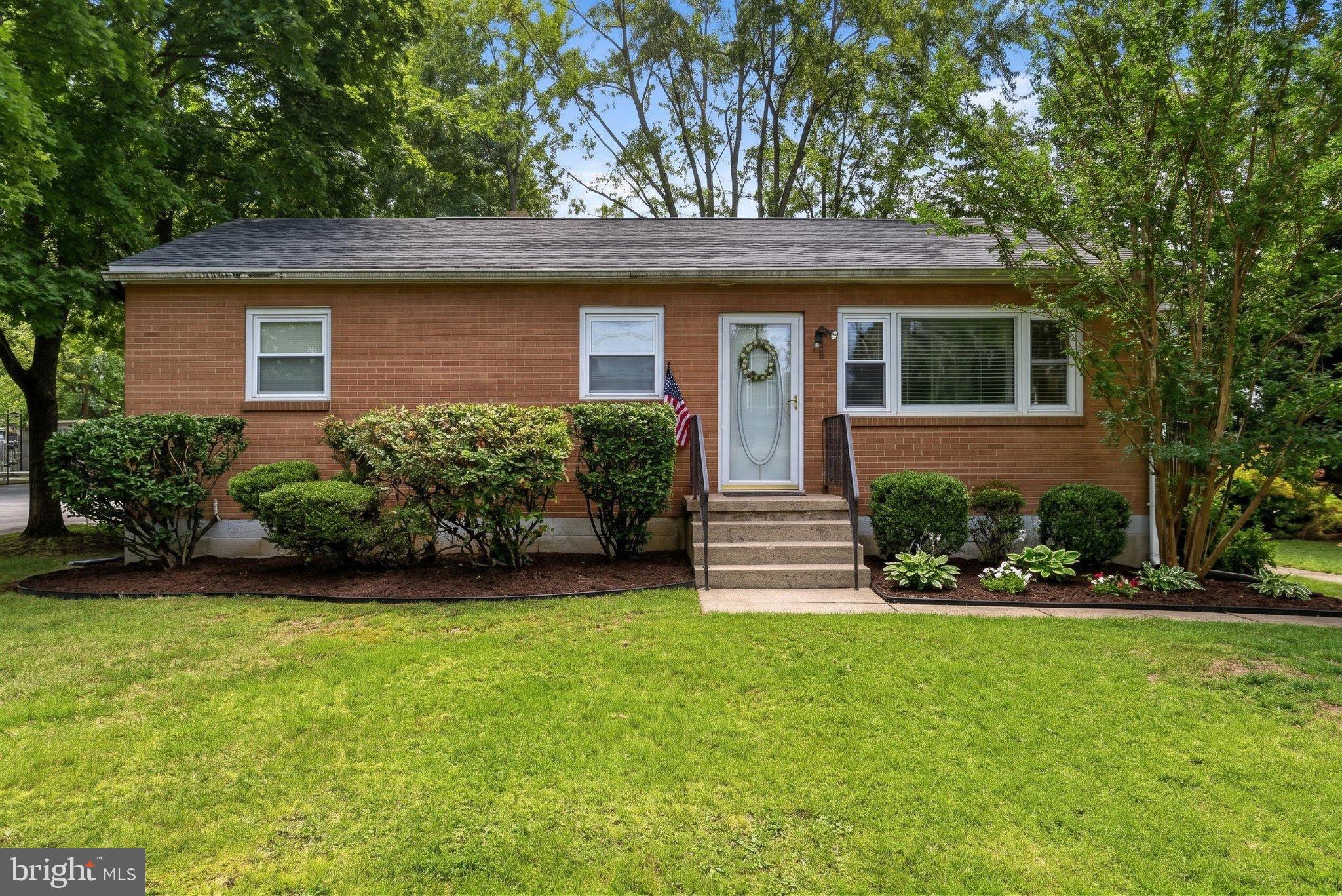 2310 Senseny Road Winchester, VA 22602 - Photo 2 of 59 Front Exterior - AI manicured flower beds