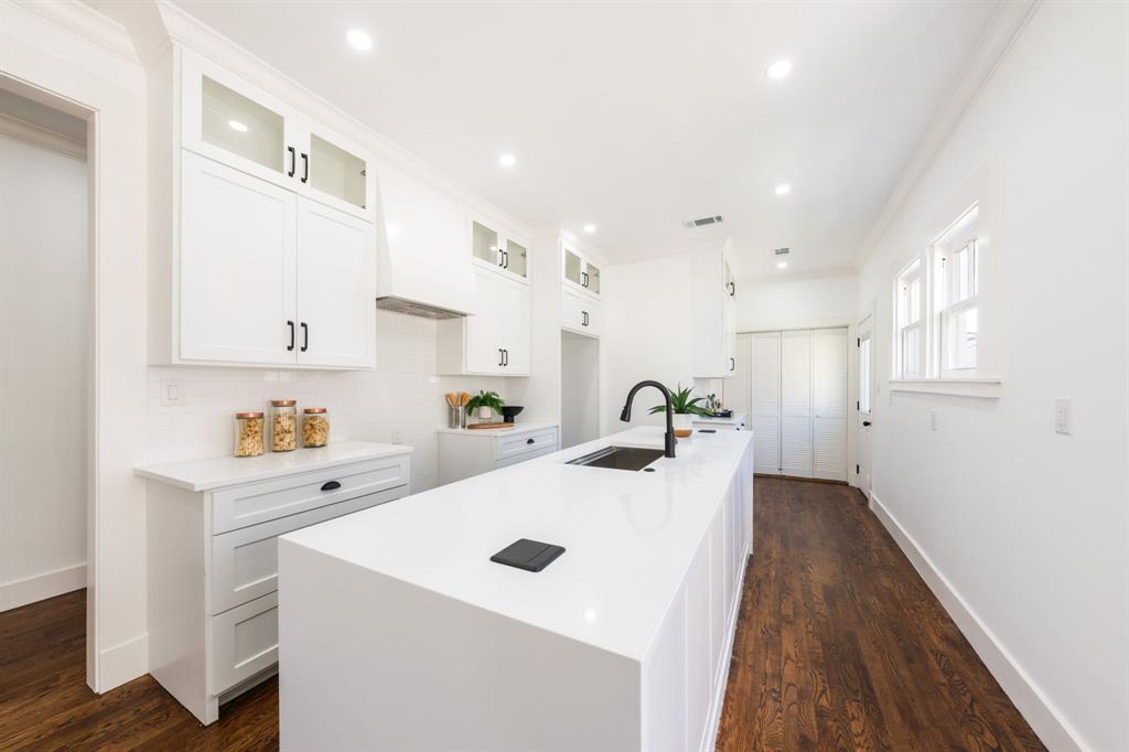 713 Ridgeway Street Dallas, TX 75214 - Photo 12 of 29 a view of counter top space with furniture and wooden floor