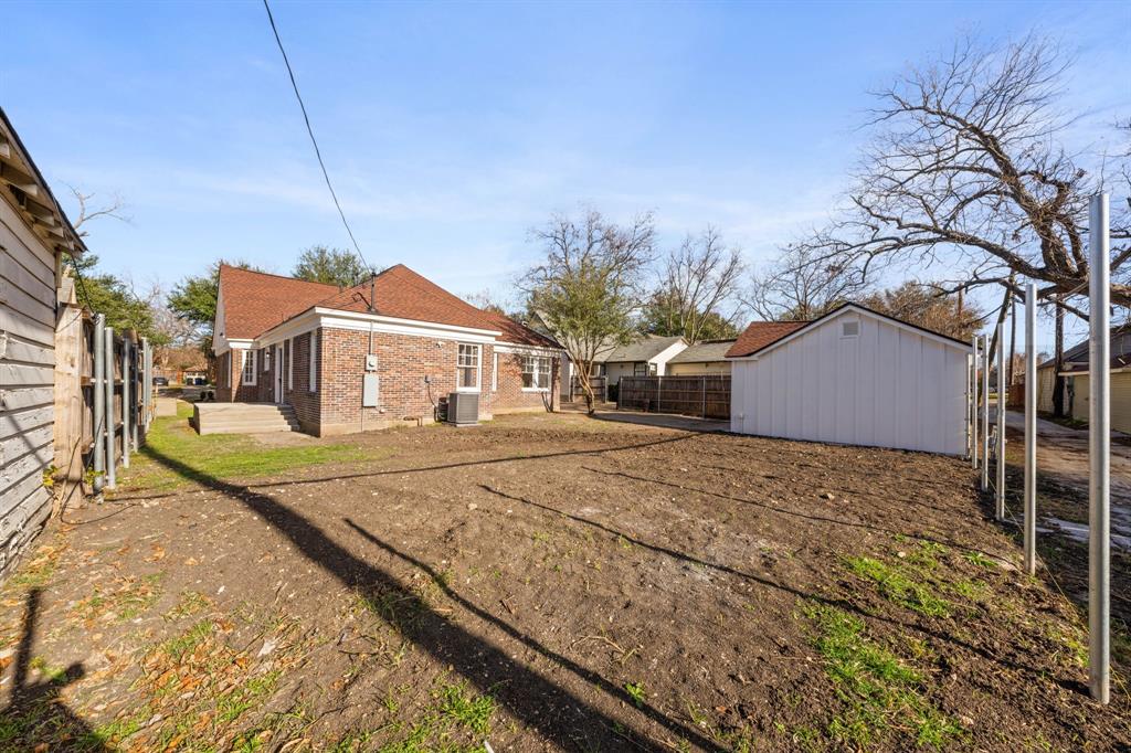 713 Ridgeway Street Dallas, TX 75214 - Photo 29 of 29 a front view of a house with a yard