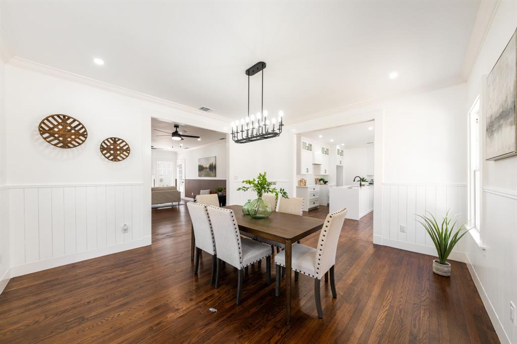 713 Ridgeway Street Dallas, TX 75214 - Photo 8 of 29 a view of a dining room with furniture wooden floor and a chandelier