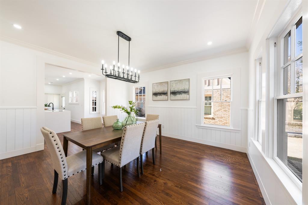 713 Ridgeway Street Dallas, TX 75214 - Photo 9 of 29 a view of a dining room with furniture window and wooden floor