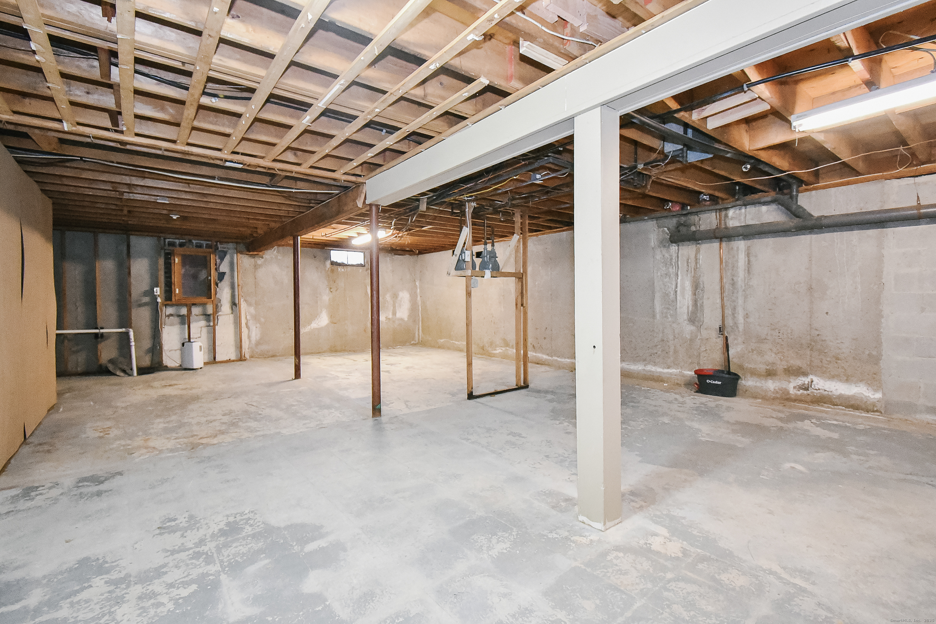 4 Georgetown Drive, Unit A Enfield, CT 06082 - Photo 18 of 20 a view of a room with wooden walls
