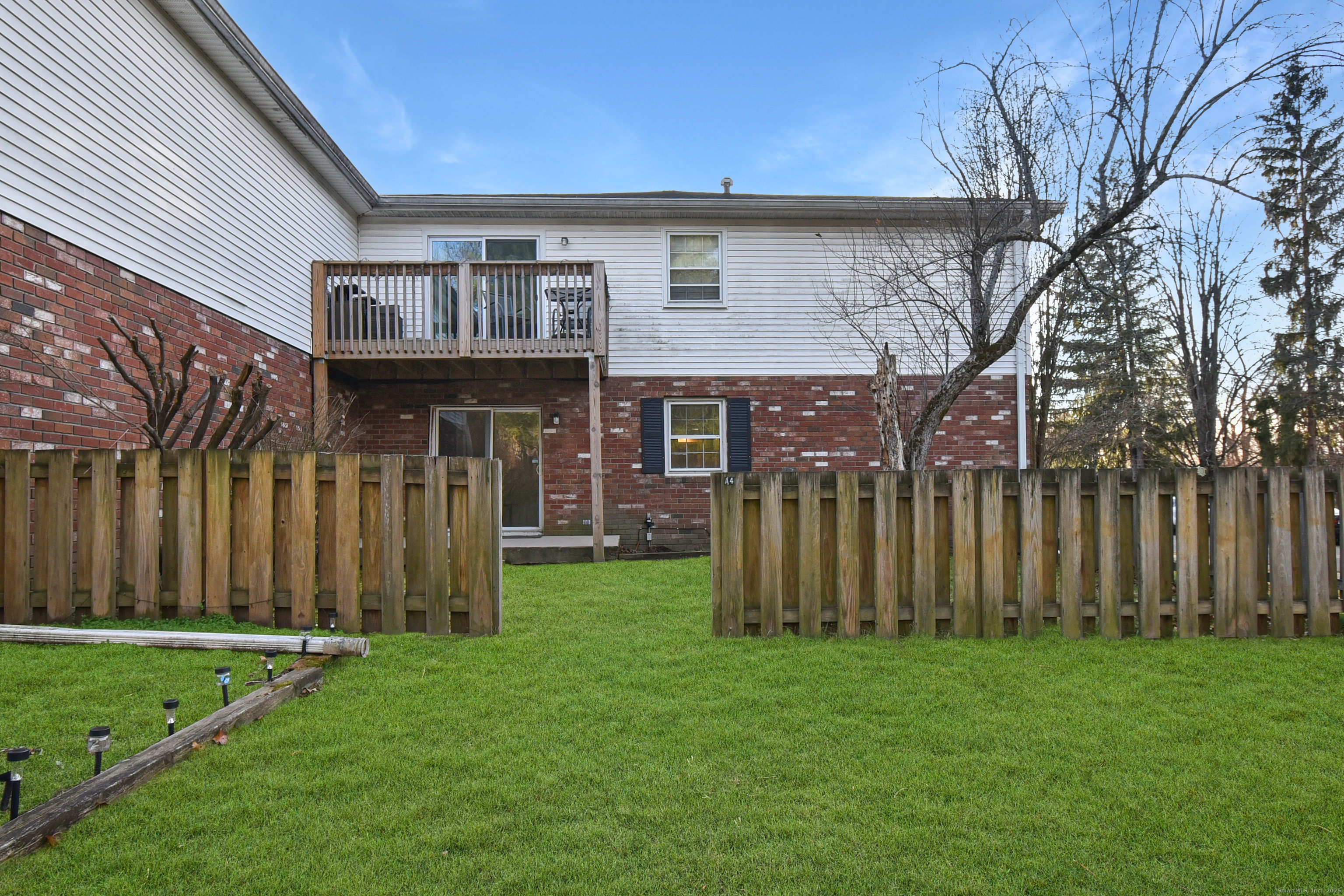 4 Georgetown Drive, Unit A Enfield, CT 06082 - Photo 19 of 20 a front view of a house with garden