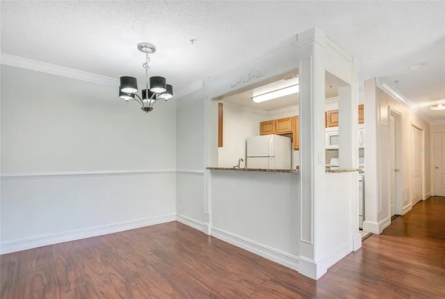 a view of a livingroom with wooden floor