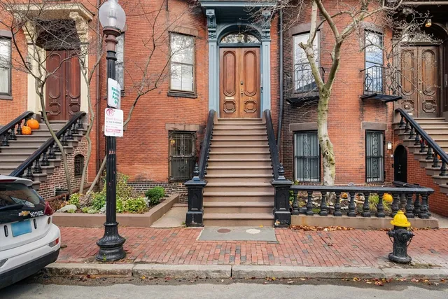 a front view of a building with street view