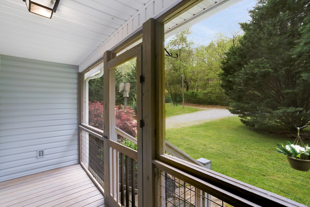 6487 Crooked Creek Road Young Harris, GA 30582 - Photo 7 of 35 Screened front porch
