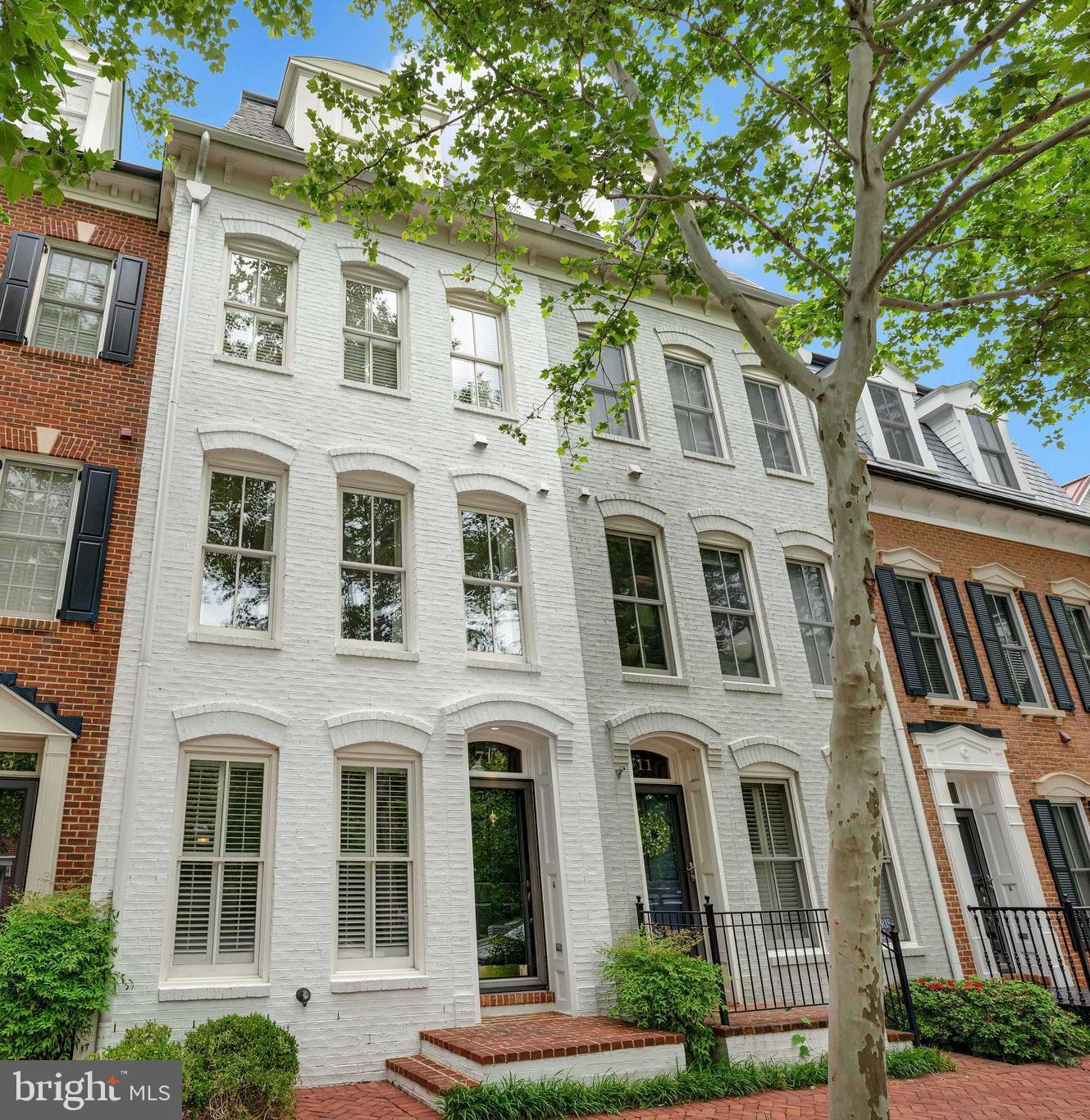 713 Carpenter Road Alexandria, VA 22314 - Photo 1 of 65 Classic Brick Front Townhome in Potomac Greens