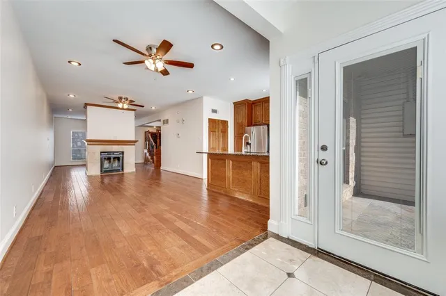 a view of a livingroom with a kitchen