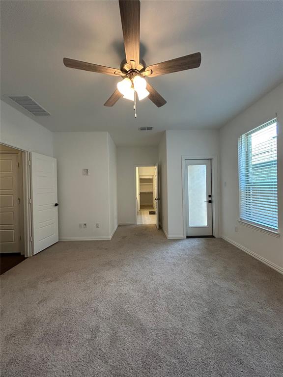 1448 Sun Gdn Way Justin, TX 76247 - Photo 14 of 28 Unfurnished bedroom featuring carpet floors and a ceiling fan